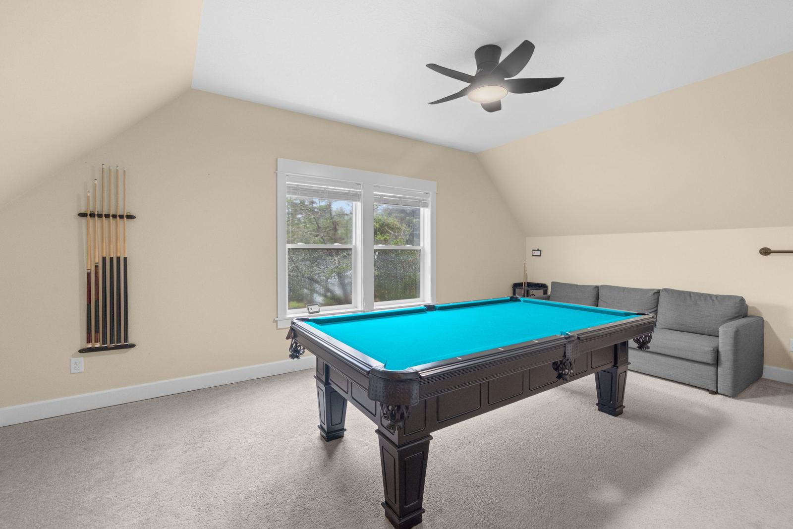 Upstairs pool room with pull-out sofa